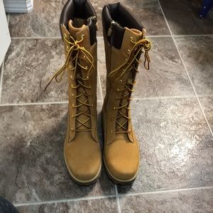 Women’s mid calf premium 14in zip timberland.